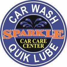 A circular logo that reads "Sparkle Quick Lube Car Wash Car Care Center".